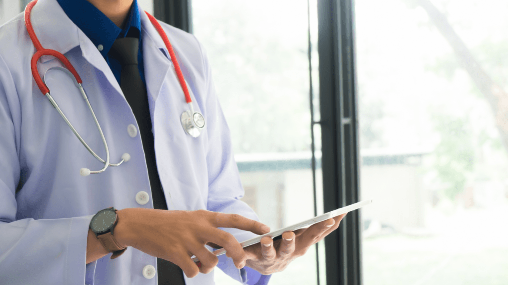 healthcare social media strategy. doctor holding ipad